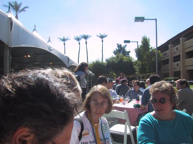 Lunch with palmtrees at AYE, in the foreground Naomi Karten and Johanna Rothman